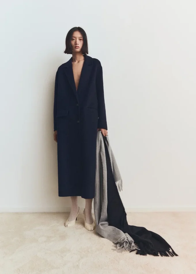 Sciarpa con bordi sfrangiati Sciarpa con bordi sfrangiati