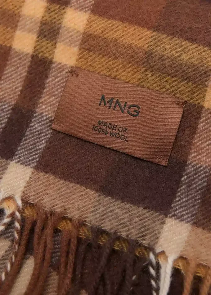 Sciarpa in lana a quadri Sciarpa in lana a quadri