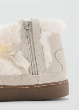 Stivaletti con dettagli in pelle