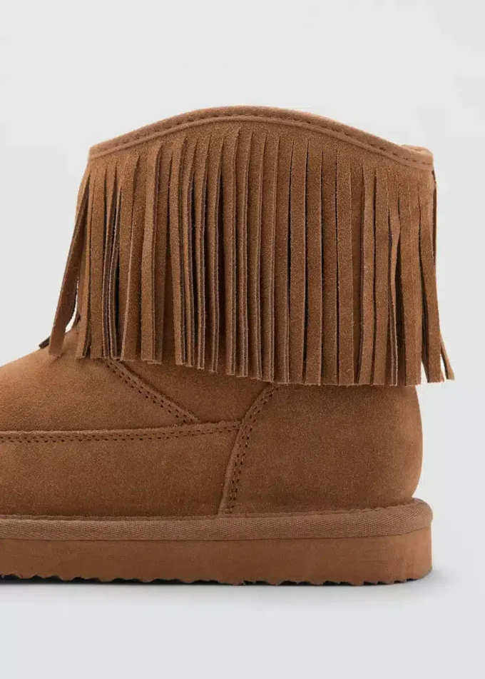 Stivali in pelle con frange Stivali in pelle con frange