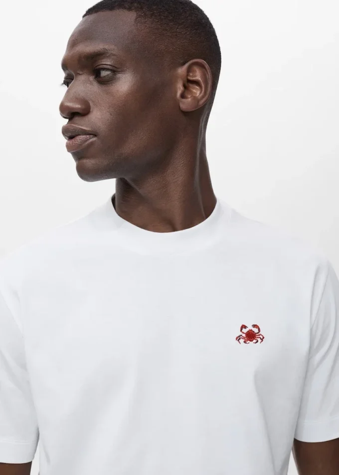 T-shirt 100% cotone con dettaglio ricamato T-shirt 100% cotone con dettaglio ricamato