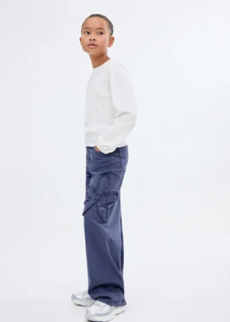 T-shirt a maniche lunghe con volant T-shirt a maniche lunghe con volant