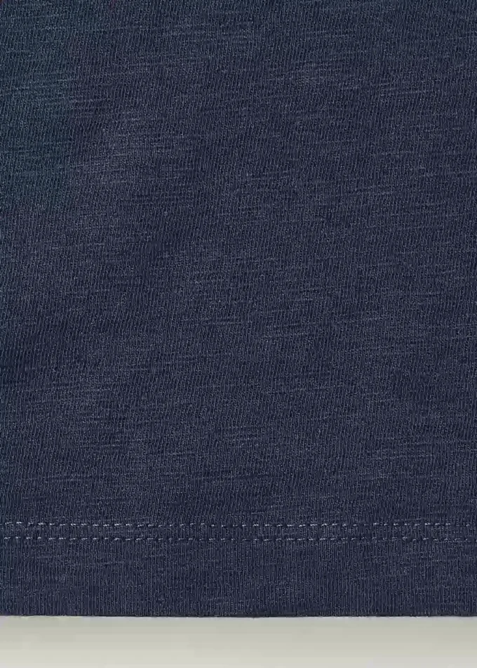 T-shirt con bottoni in madreperla