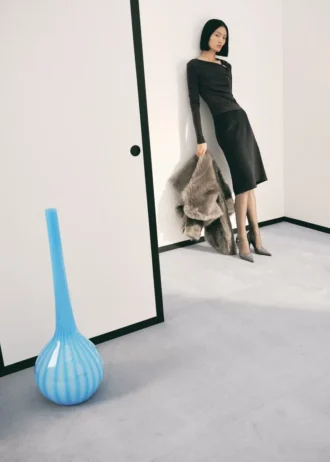 T-shirt con dettagli in metallo