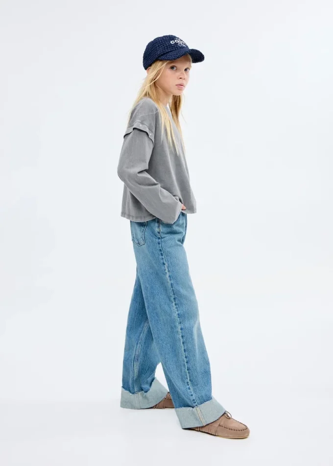 T-shirt con dettagli in perline T-shirt con dettagli in perline