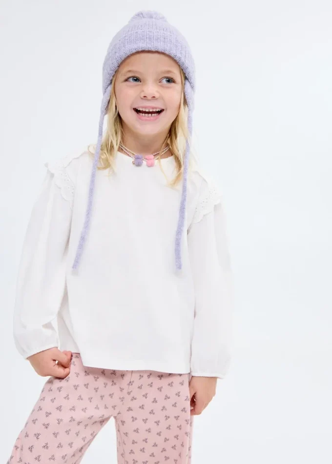 T-shirt con dettagli in pizzo T-shirt con dettagli in pizzo