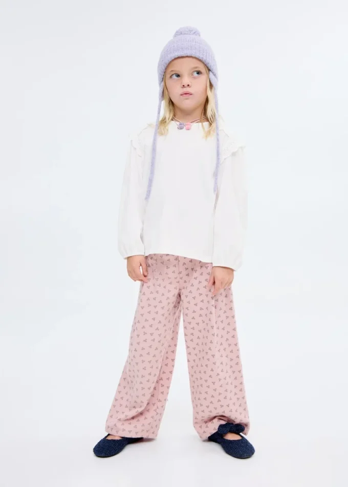 T-shirt con dettagli in pizzo T-shirt con dettagli in pizzo