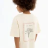 T-shirt con stampa tropicale T-shirt con stampa tropicale