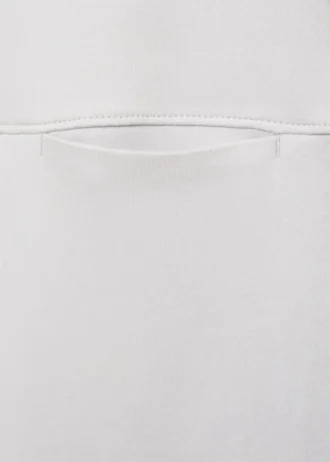 T-shirt con tasca e cuciture a vista