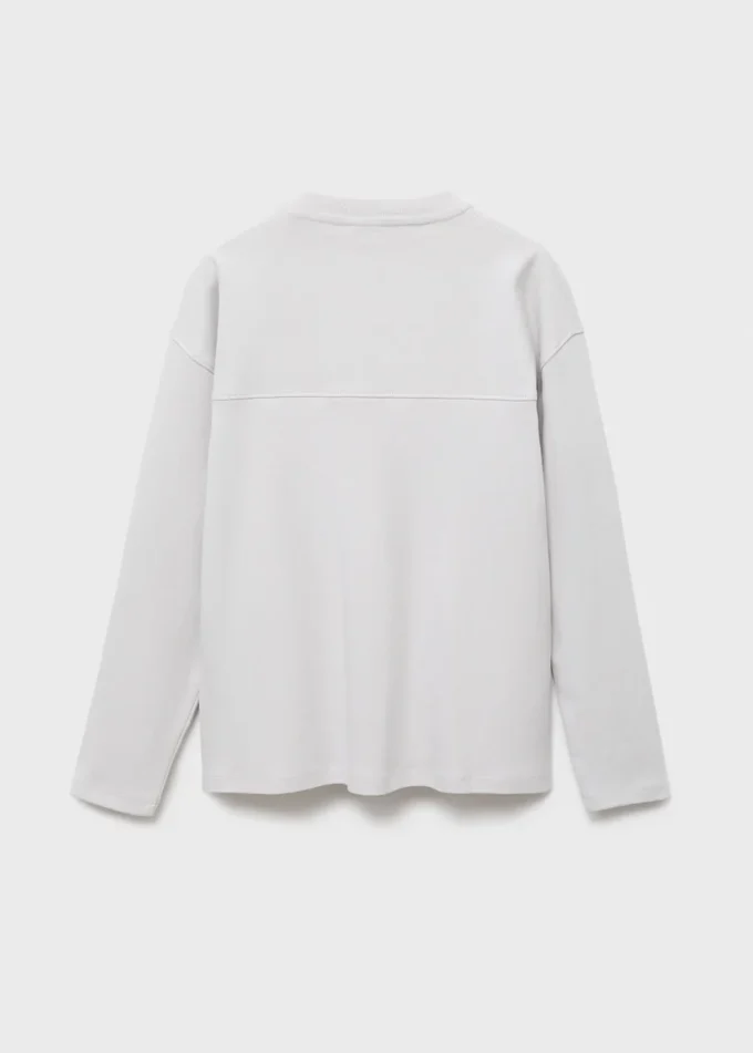 T-shirt con tasca e cuciture a vista T-shirt con tasca e cuciture a vista