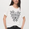 T-shirt in cotone con ricami floreali T-shirt in cotone con ricami floreali