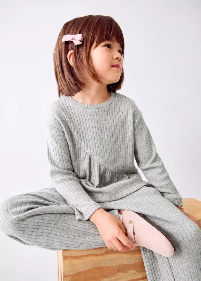 Top a costine con volant Top a costine con volant