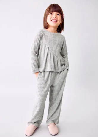 Top a costine con volant Top a costine con volant