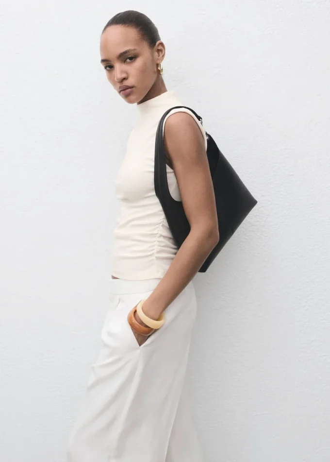 Top aderente con ruches Top aderente con ruches