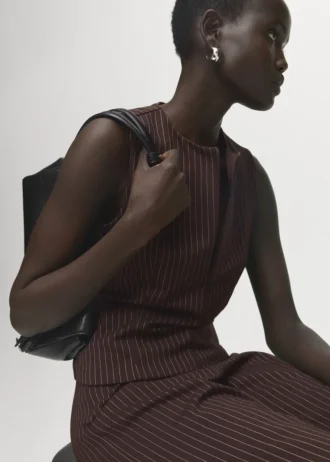 Top aderente con zip