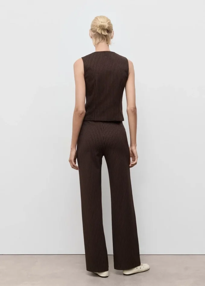 Top aderente con zip Top aderente con zip