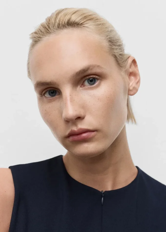 Top aderente con zip Top aderente con zip