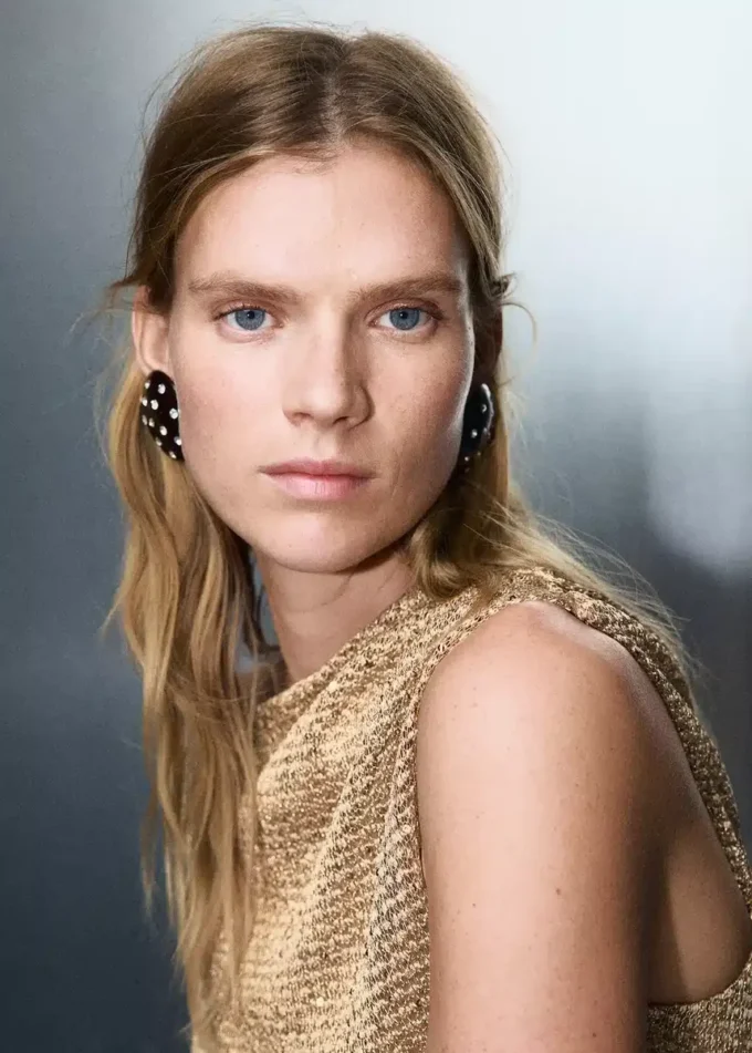 Top asimmetrico con paillettes Top asimmetrico con paillettes