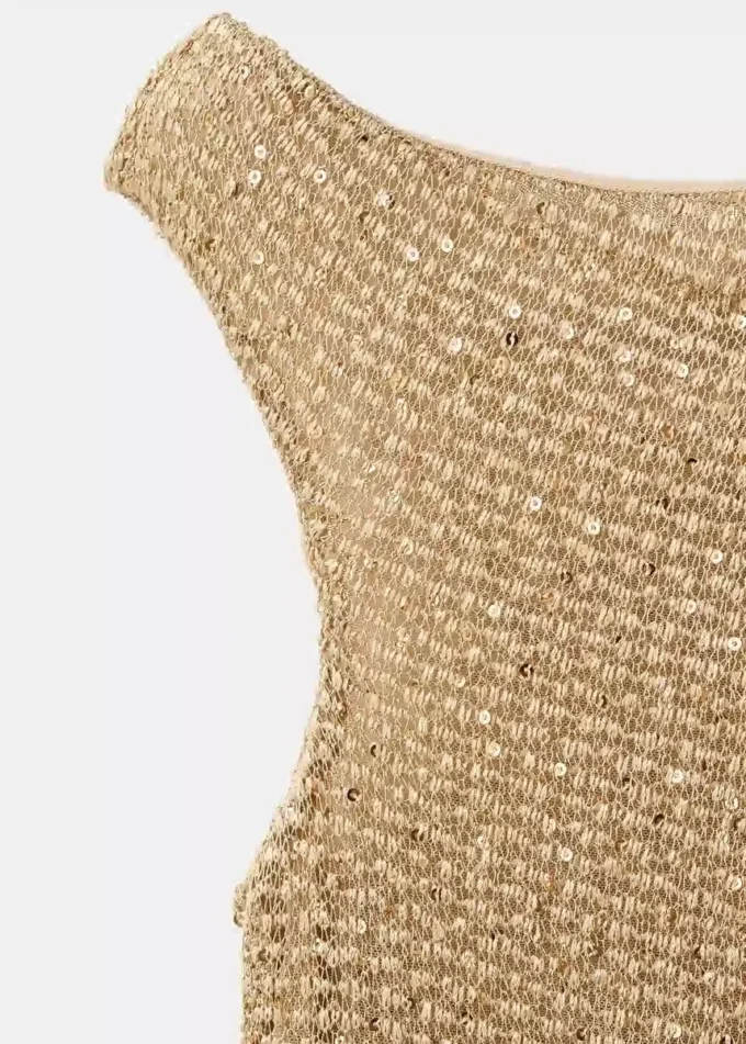 Top asimmetrico con paillettes Top asimmetrico con paillettes