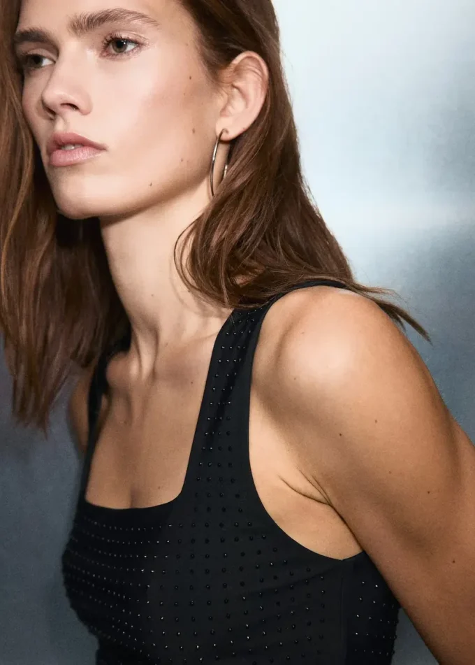 Top con cinturini e dettagli in strass Top con cinturini e dettagli in strass