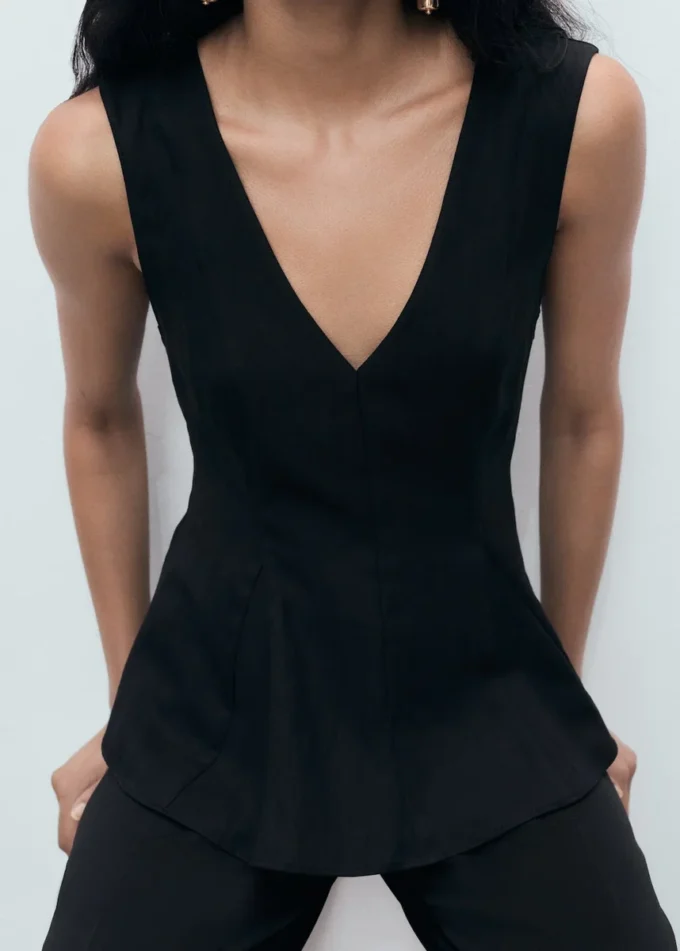 Top con peplo in lyocell Top con peplo in lyocell