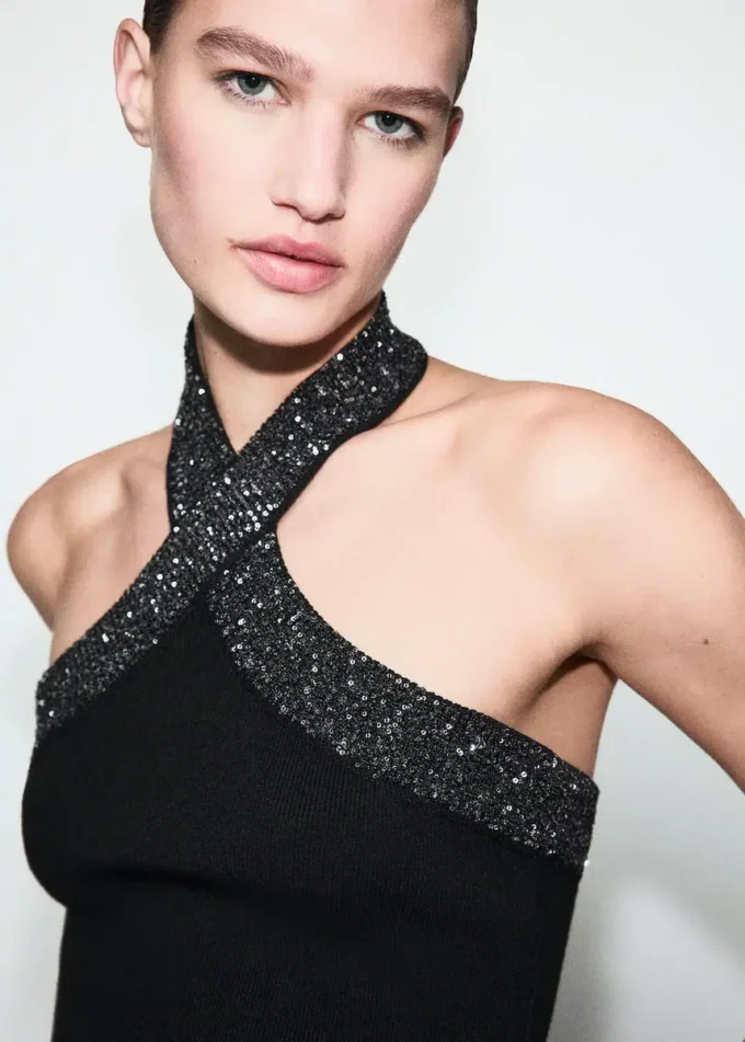 Top con scollo all’americana e glitter Top con scollo all’americana e glitter