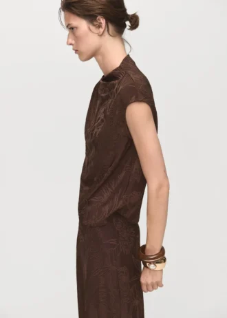 Top con stampa floreale jacquard Top con stampa floreale jacquard