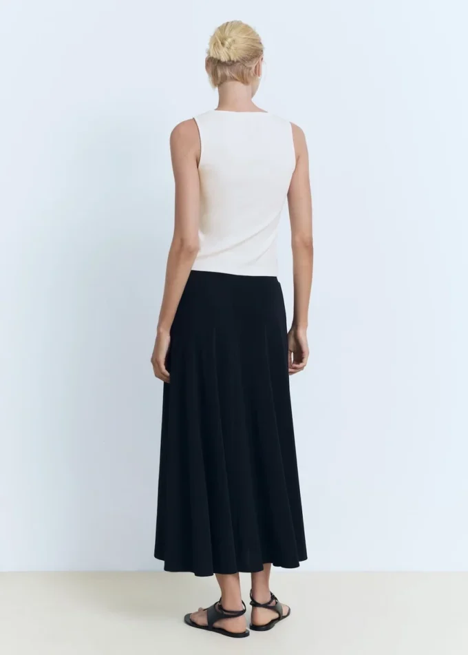 Top in cotone con borchie Top in cotone con borchie