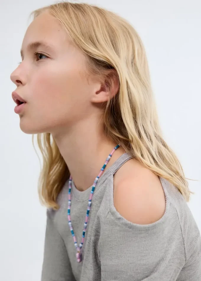 Top in lurex con cut-out Top in lurex con cut-out