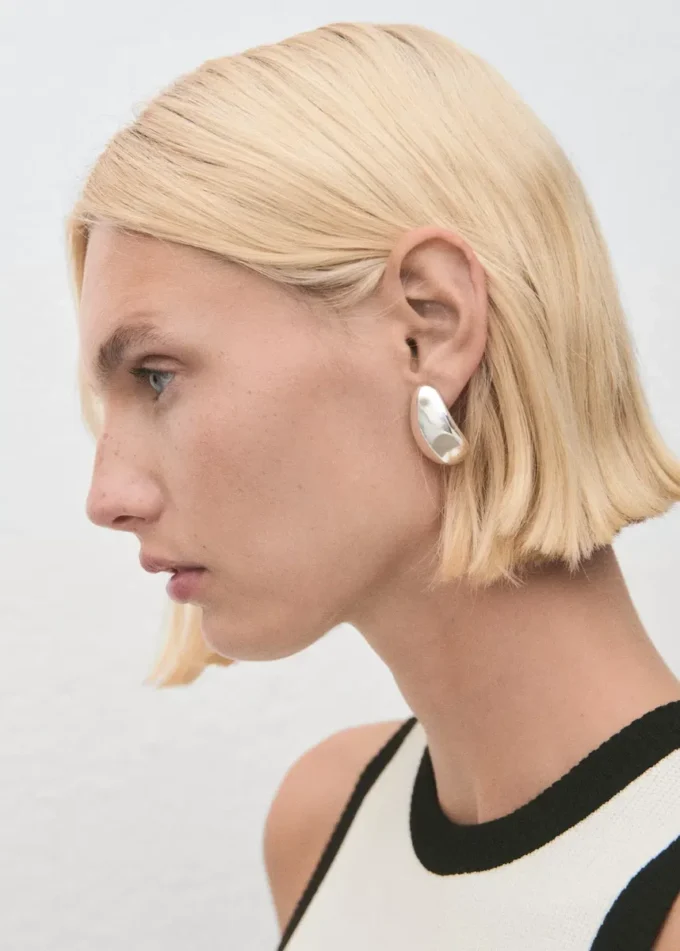 Top in maglia con bordino a contrasto Top in maglia con bordino a contrasto