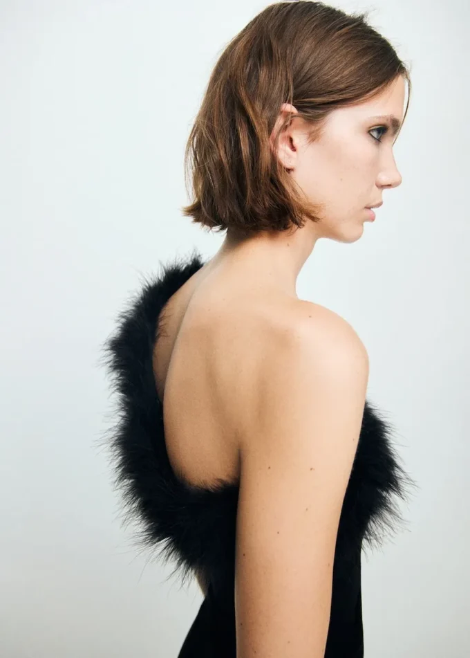 Top in maglia fine con piume Top in maglia fine con piume