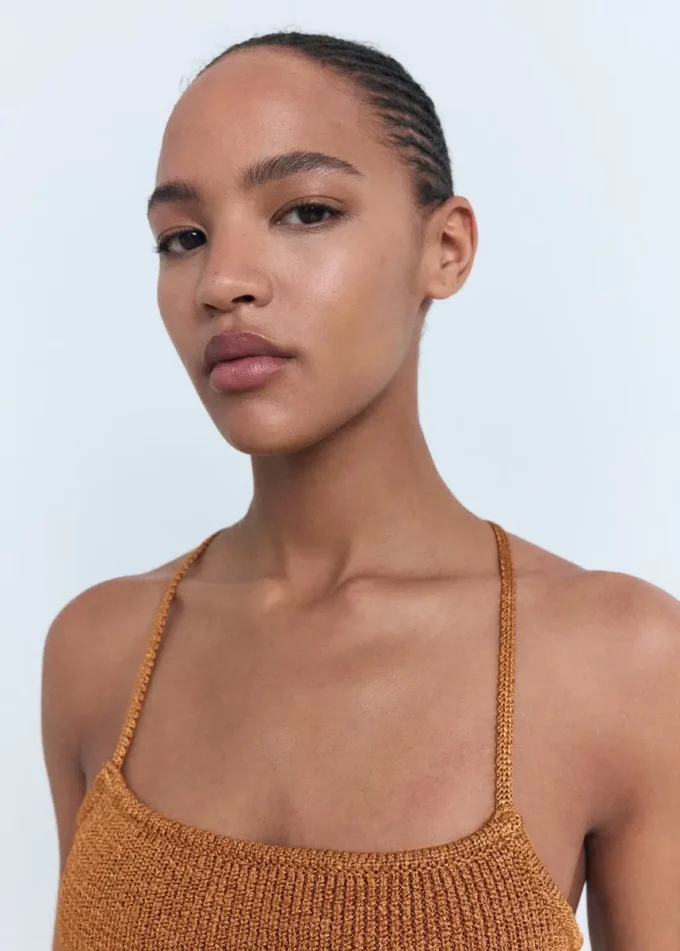 Top in maglia lurex con incrocio sulla schiena Top in maglia lurex con incrocio sulla schiena