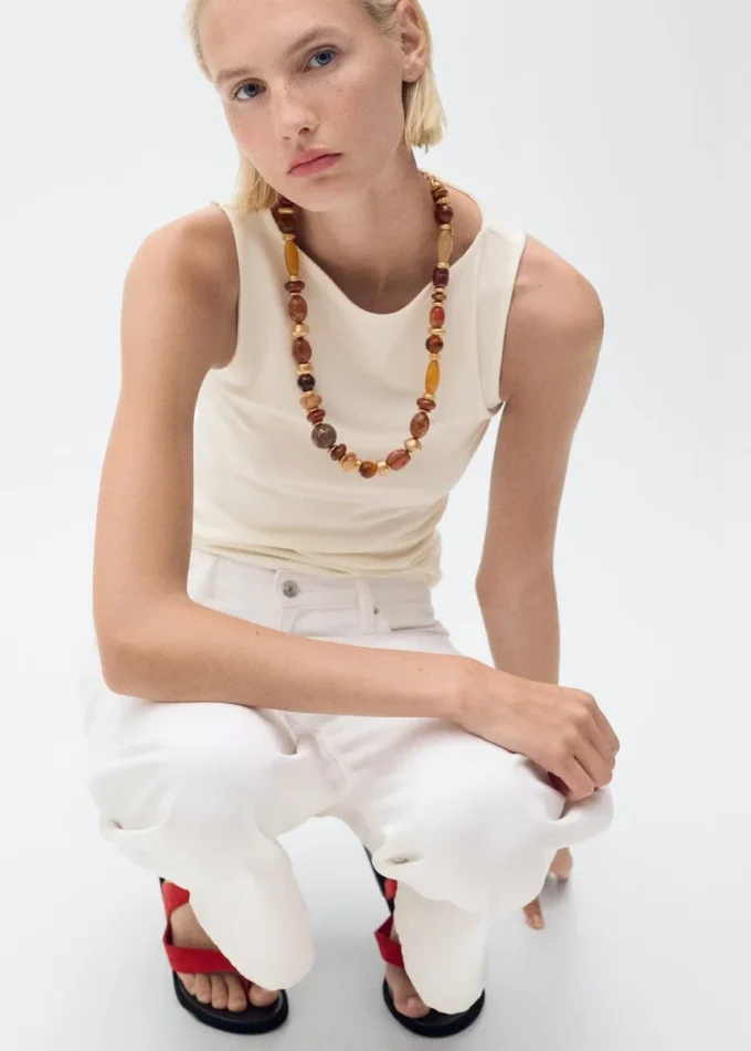 Top senza spalline con scollo a barchetta Top senza spalline con scollo a barchetta