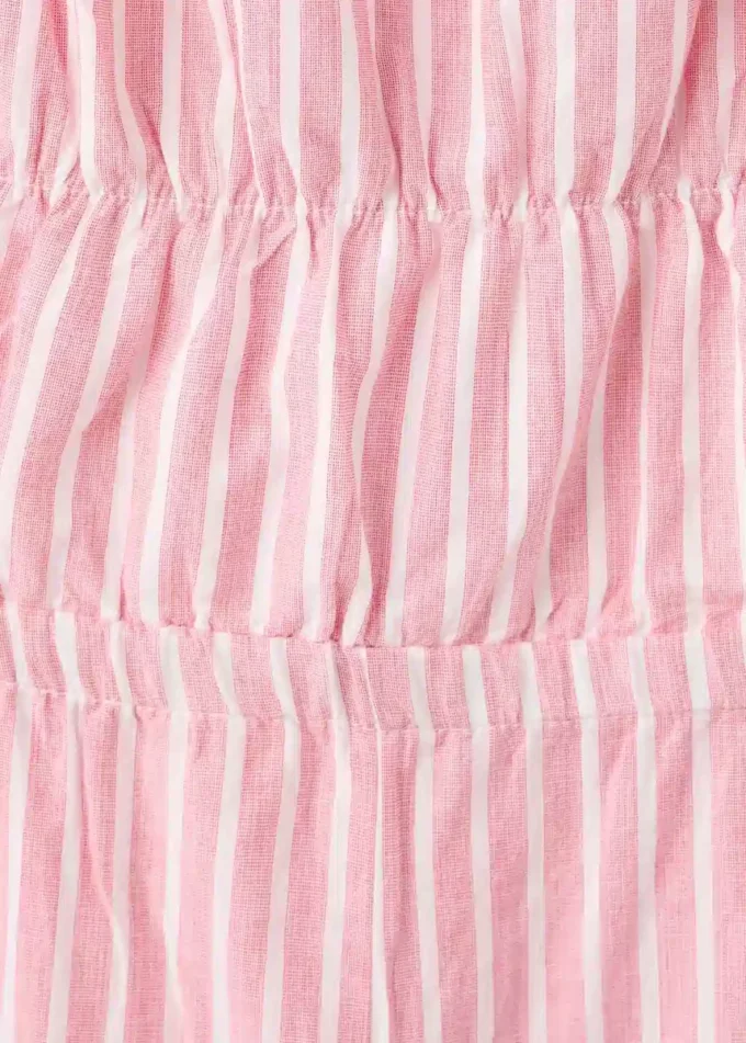 Tuta a righe con apertura Tuta a righe con apertura