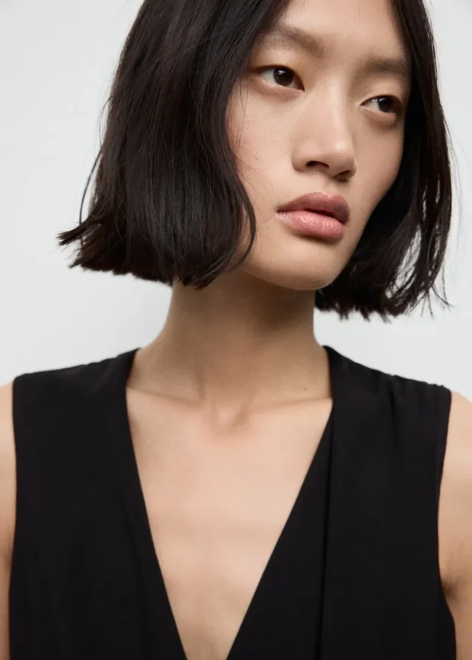 Tuta con cintura avvolgente Tuta con cintura avvolgente