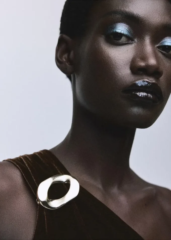 Tuta in velluto con dettagli metallici Tuta in velluto con dettagli metallici