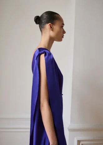 Tuta lunga con maxi volant in raso