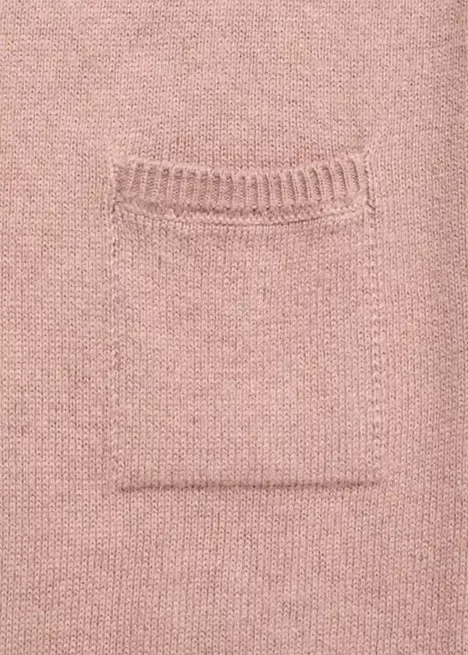 Tuta lunga con tasca sul petto